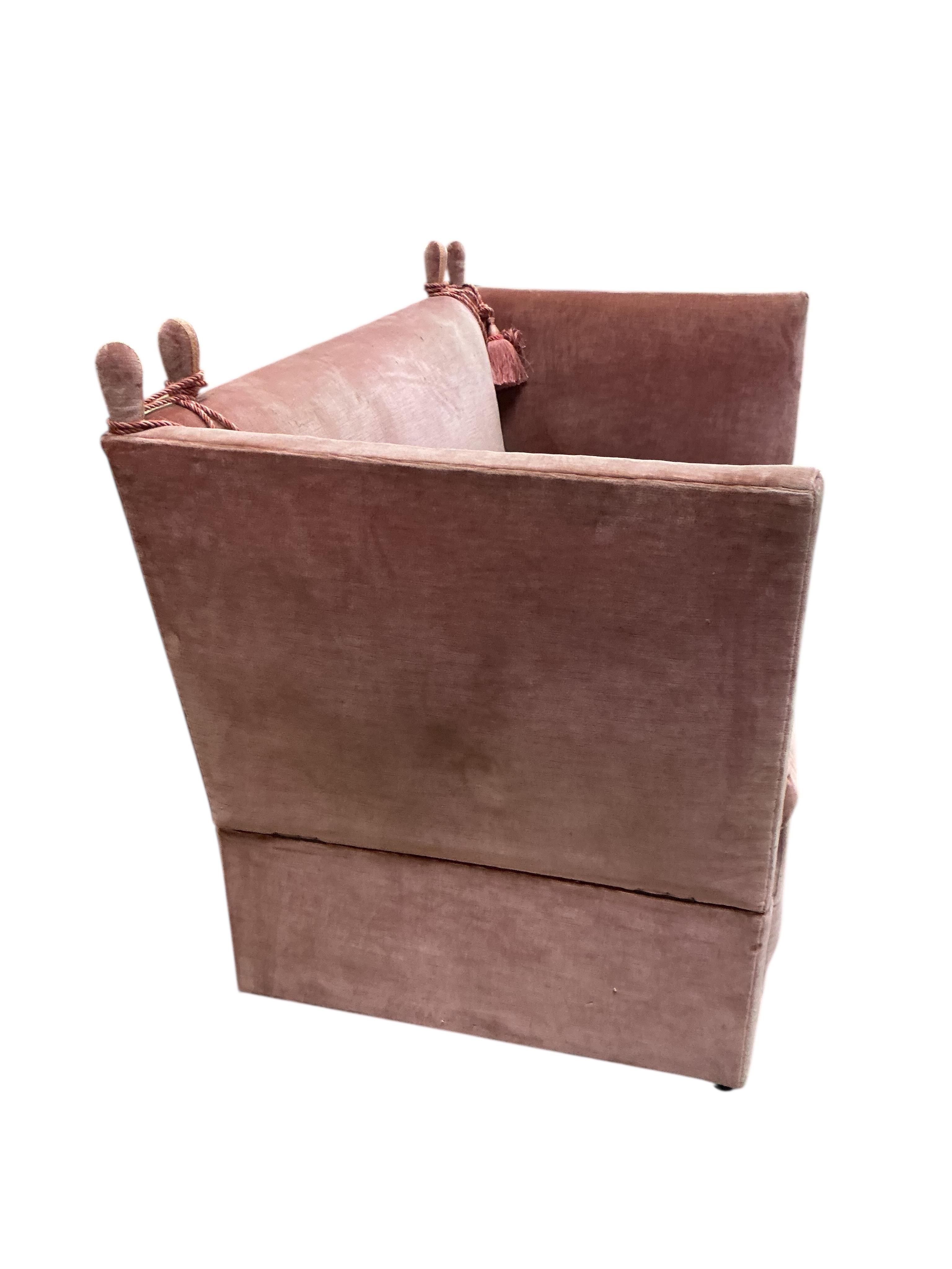 An upholstered two seater Knole settee, width 148cm, depth 84cm, height 101cm